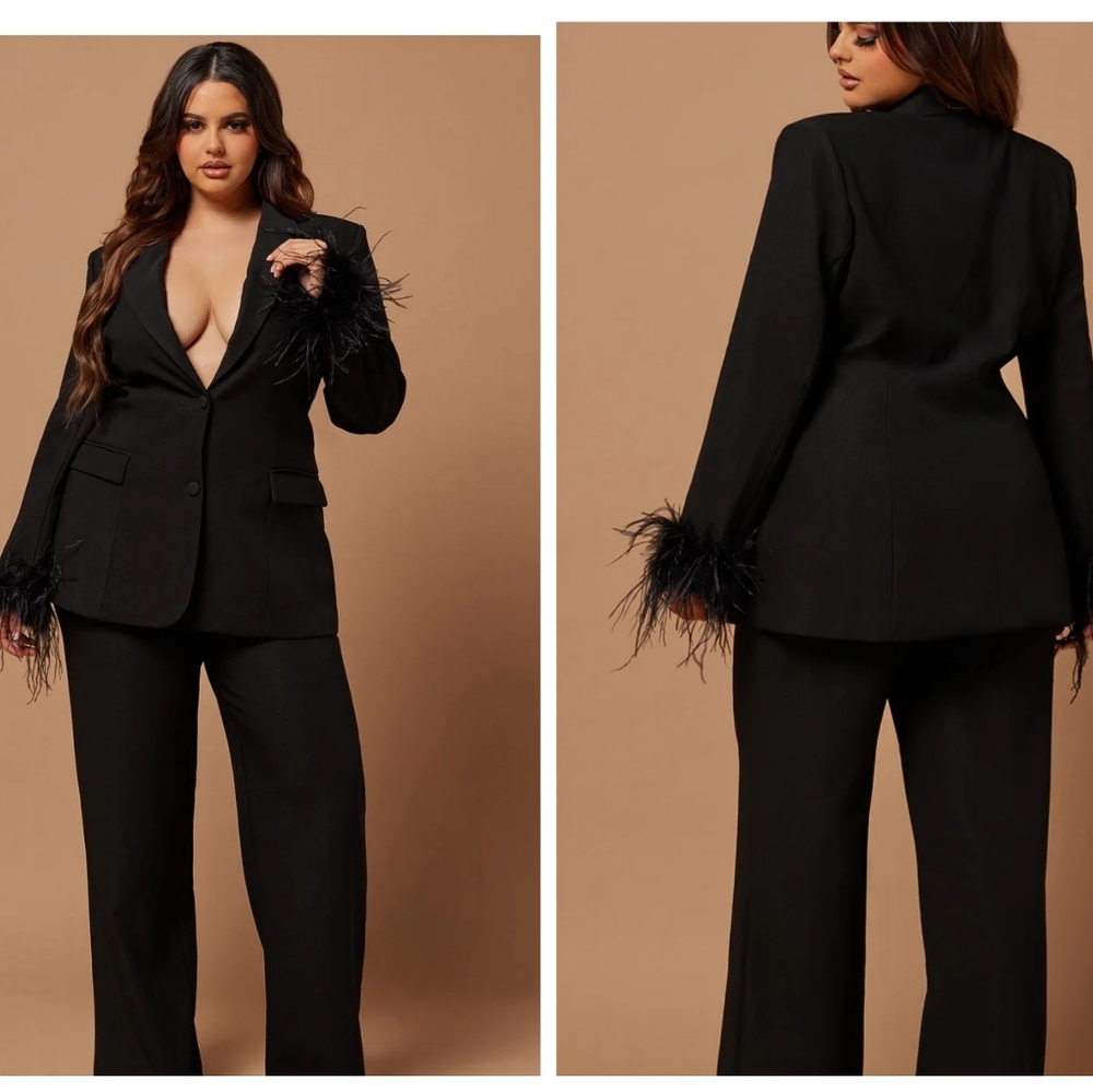 2 piece black, blazer and wide leg pant suit. New, never worn.